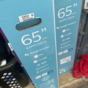 Two 65 inch Phillips smart TVs